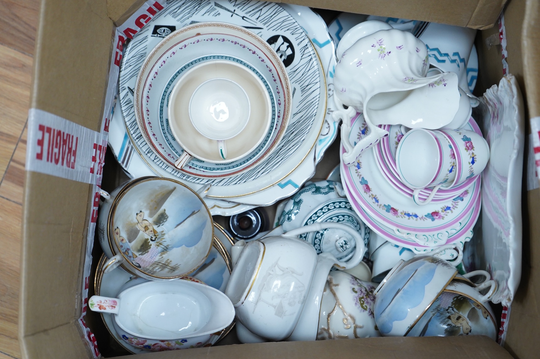 A large collection of various ceramics to include a Ridgways Homemaker plate, Japanese tea set and stoneware jugs